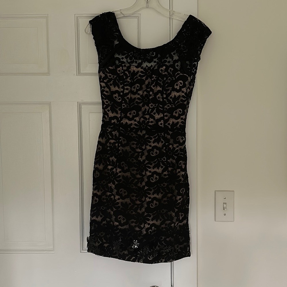 Black lace dress with deep V back and nice lining. Vera Wang Lavender Label